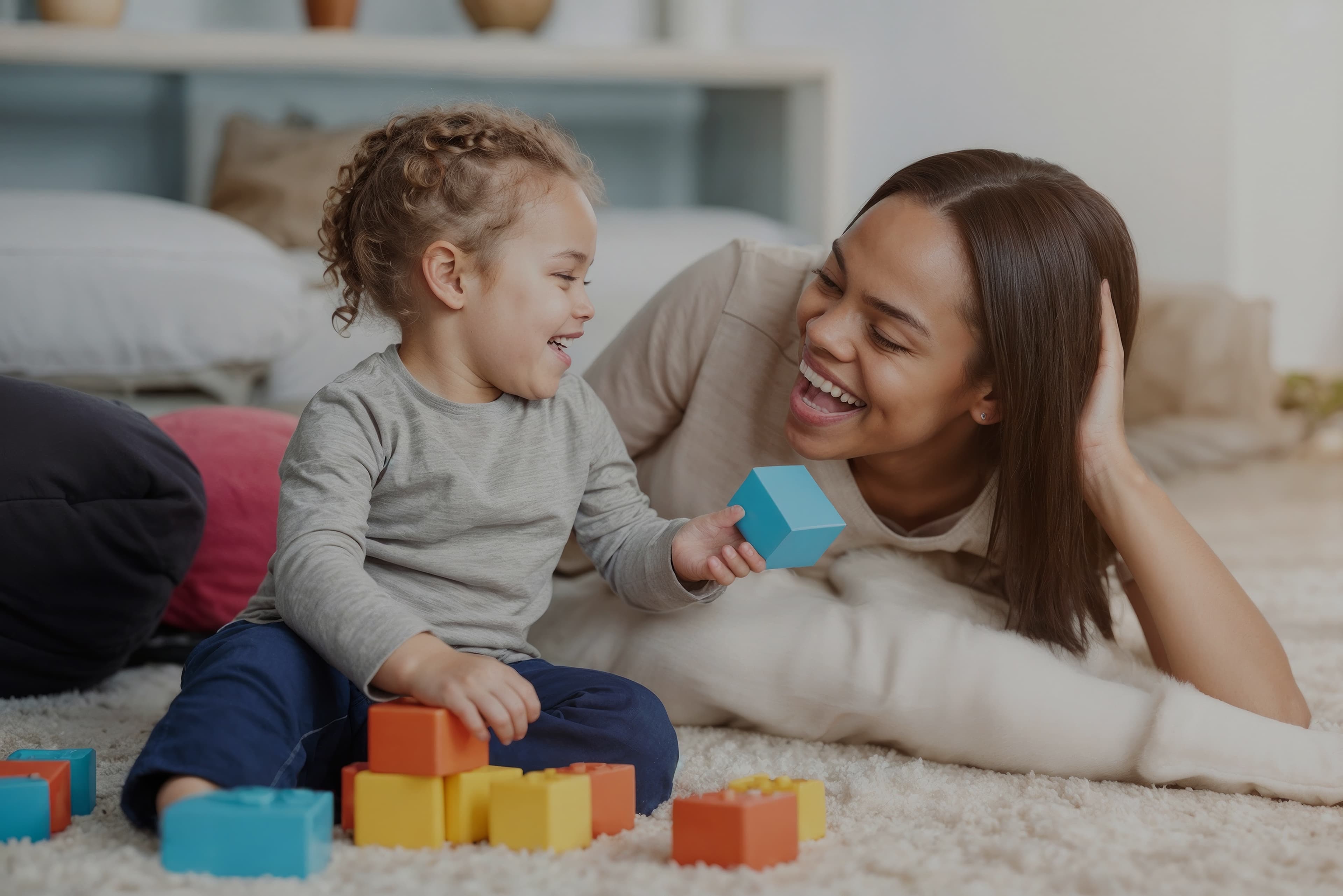 A caregiver and child sharing an everyday moment